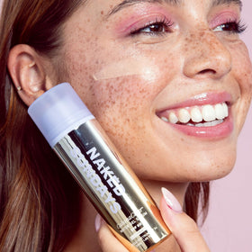 CabanaClear layered under makeup illustrating Naked Sundays primer and protection benefit