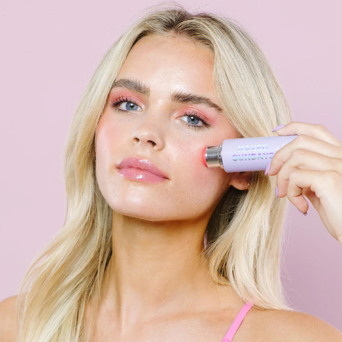 Naked Sundays used on lips for color and SPF shield during outdoor use