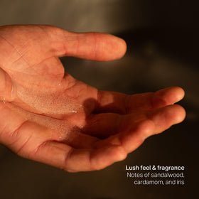 Naomi Cooking bottle beside hand showing size and real-world scale benefit