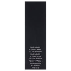 NARS Afterglow finger blending on cheek demonstrating easy, streak-free application