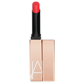 NARS scale comparison with fingers indicating compact, travel-ready size