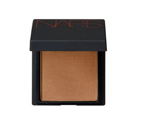 NARS Laguna mini powder swatch close-up showing texture and blendable warmth