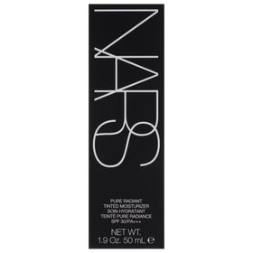 NARS Pure Radiant held in hand for size comparison showing travel-friendly design benefit
