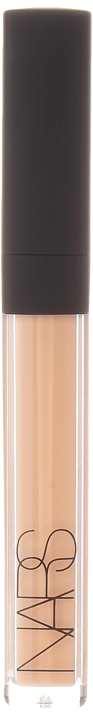 NARS concealer beside coin for scale showing compact travel-friendly benefit