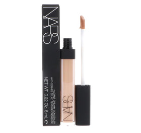 Concealer tucked inside a makeup bag illustrating portability for on-the-go touchups