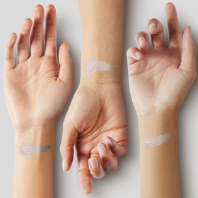 NARS application under eye demonstrating even coverage and brightening effect