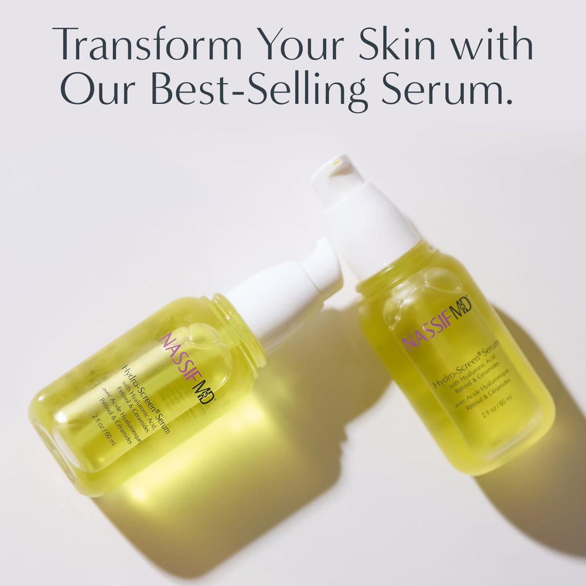 NassifMD applying serum to face in mirror showing smooth layering under makeup