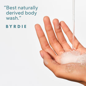 Native body wash pouring foam from pump, shows creamy lather benefit