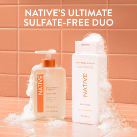 Native bottle in a peach-themed bathroom lifestyle setting for fresh scent