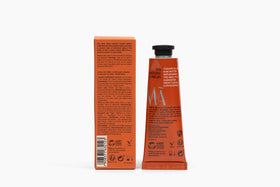 Natura tube in a handbag portraying on-the-go skincare convenience benefit