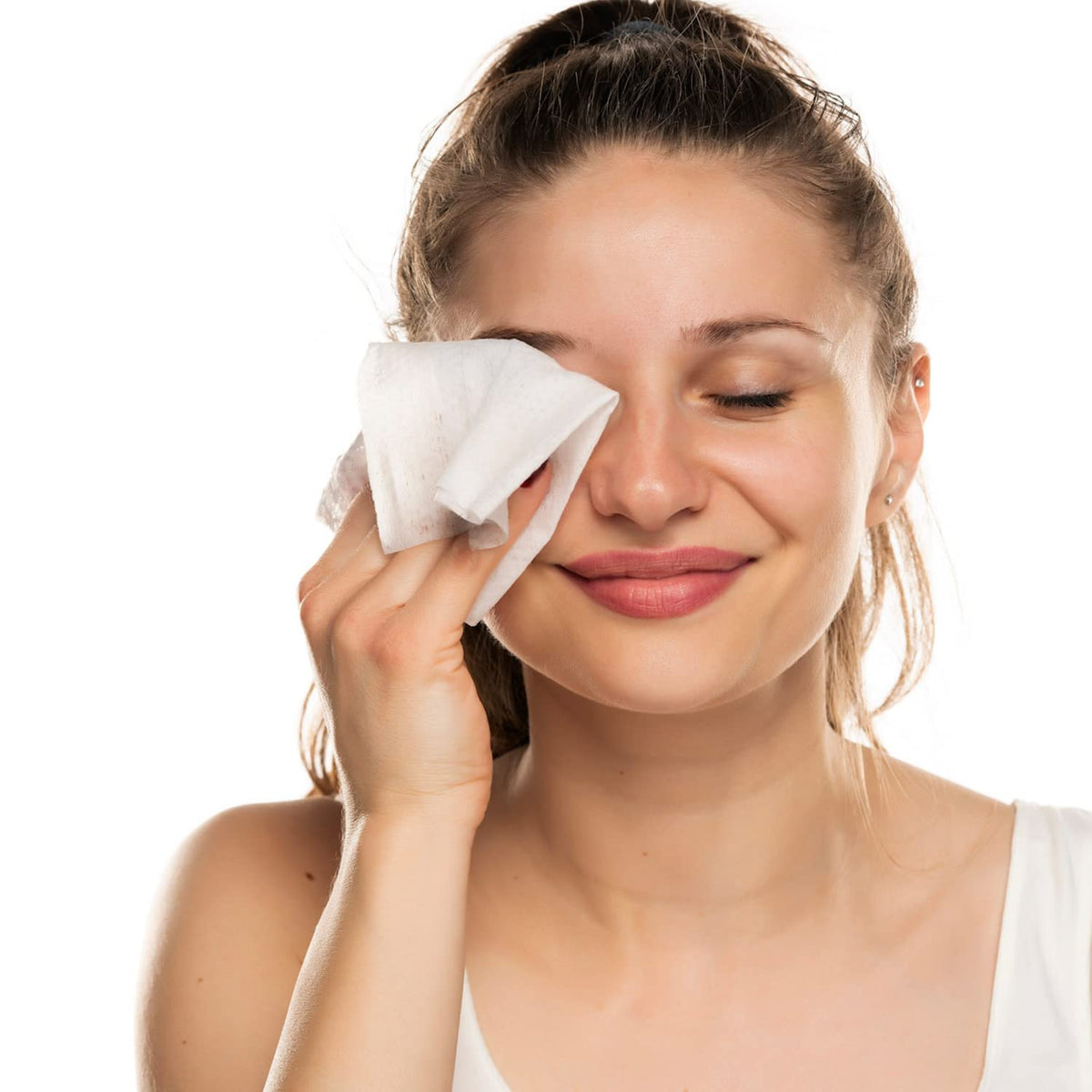 Natural Essentials wipe in hand demonstrating easy, no-rinse use