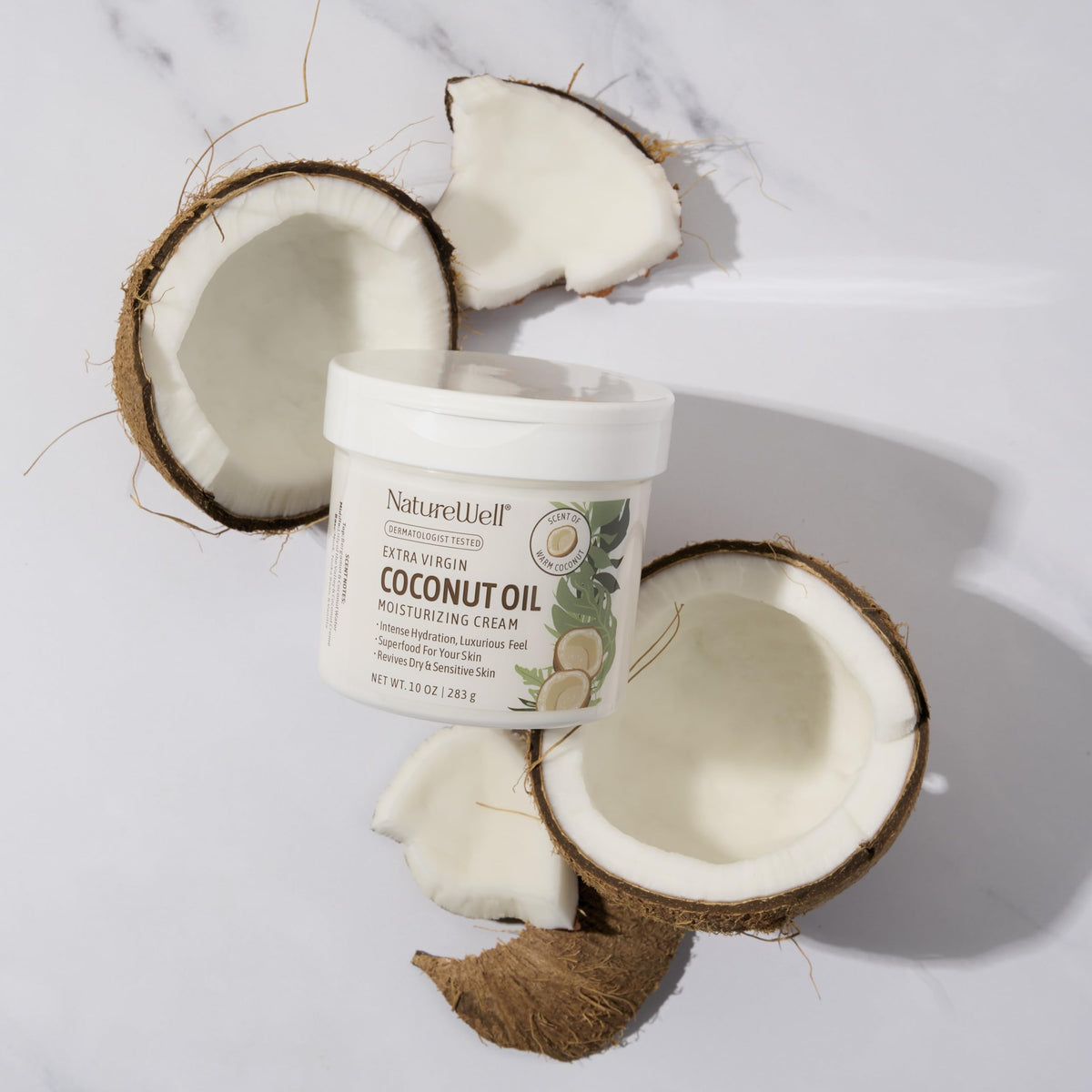 NATURE WELL open jar showing creamy coconut texture and quick absorption