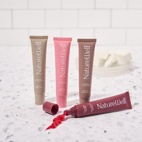 Nature Well ingredients shot with shea and murumuru butter and vitamin E indicating deep conditioning