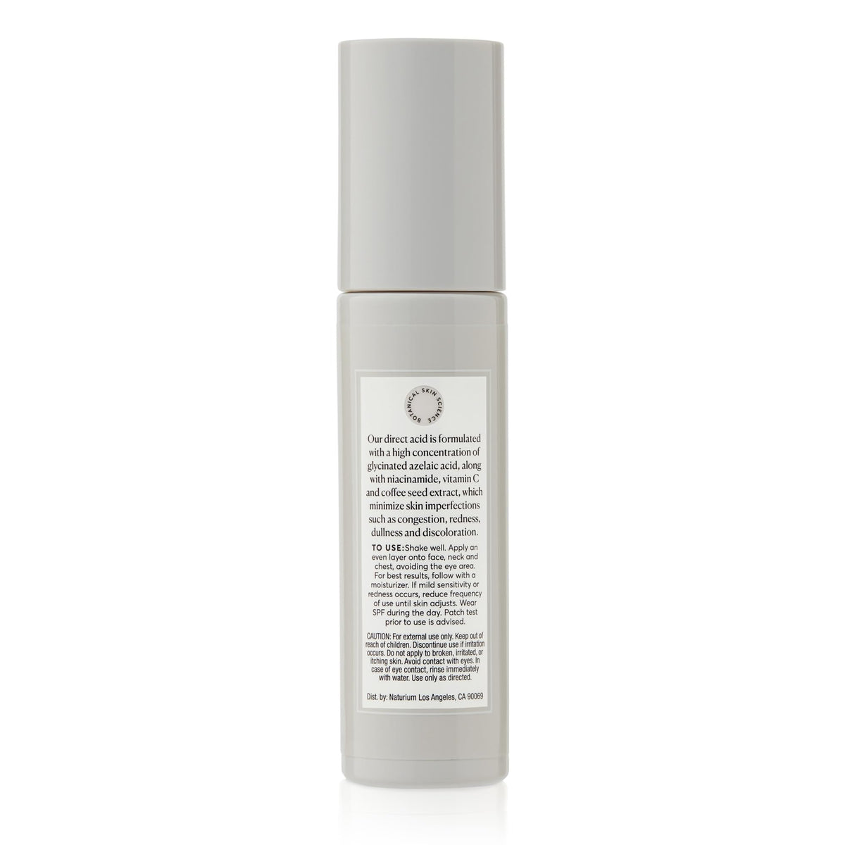 Naturium bottle next to towel in bathroom routine scene showing daily use compatibility