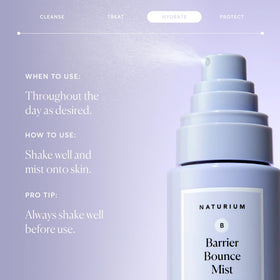 Close-up droplet of Naturium mist texture on fingertip demonstrating lightweight hydration