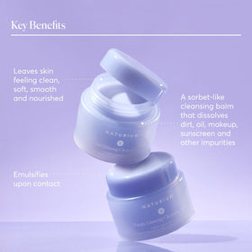 Naturium balm in hand demonstrating how it melts to oil for easy cleansing
