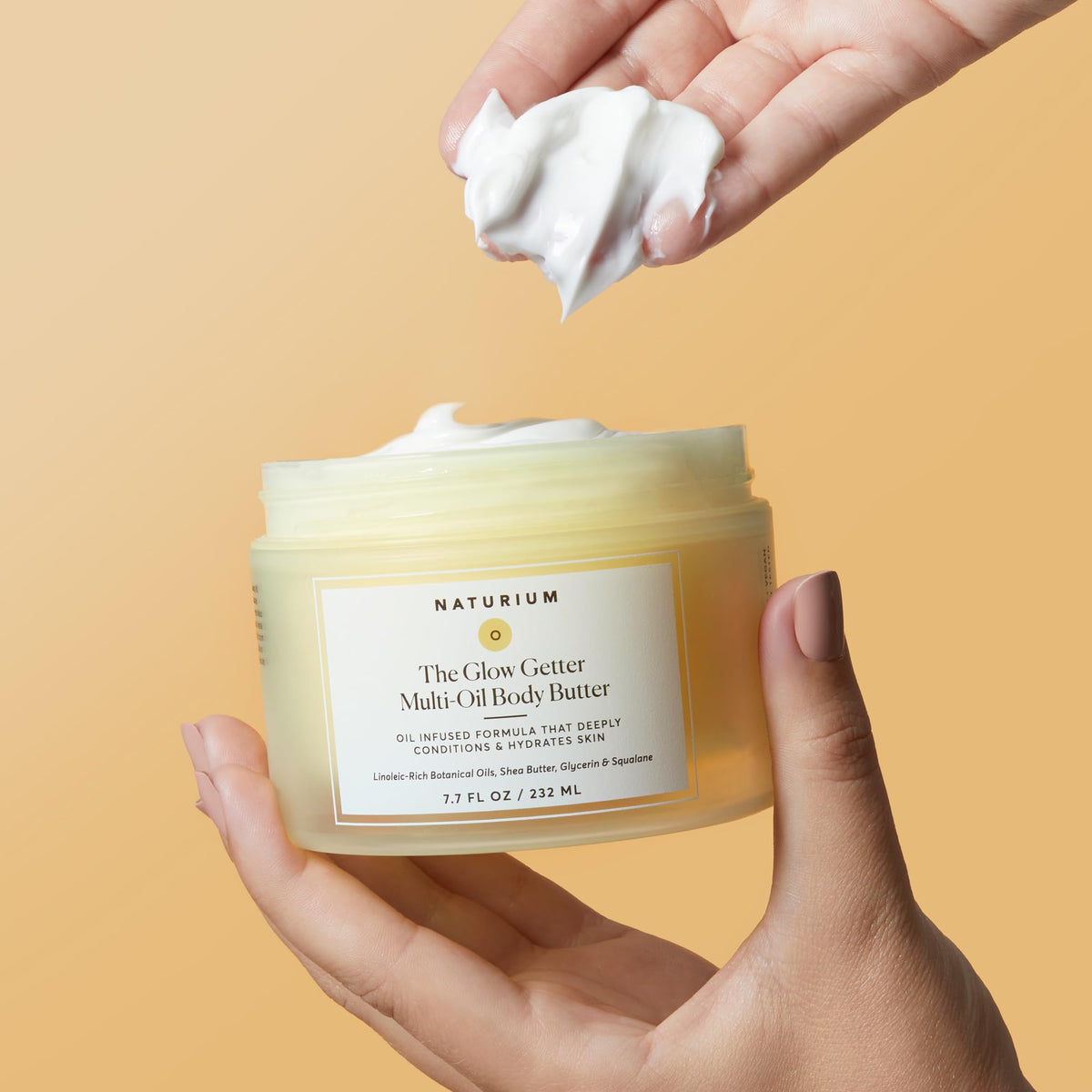 Naturium product beside hand for scale, communicating actual 7.7 fl oz size