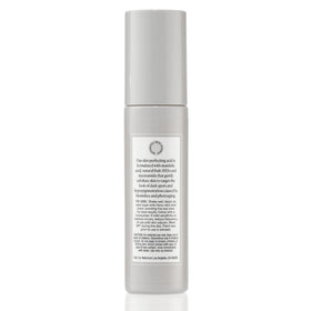 Naturium bottle styled on bathroom shelf conveying everyday routine and elegance