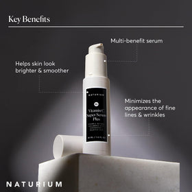 Naturium ingredients flatlay with vitamin C and hyaluronic acid benefits