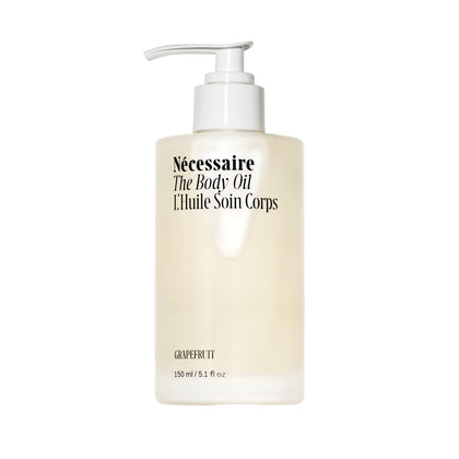 Nécessaire bottle front view showing packaging and size benefit