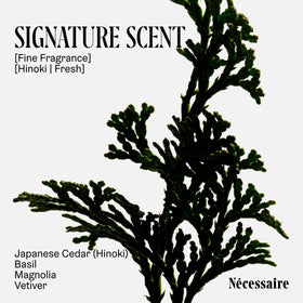 Nécessaire bottle tucked inside a duffel bag demonstrating easy travel portability