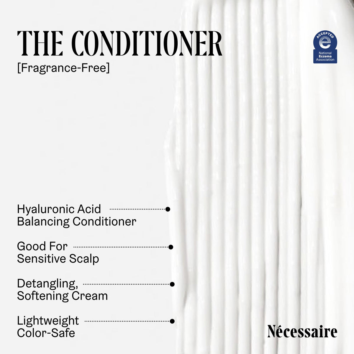 Nécessaire 250ml bottle next to a hand for scale and travel-friendly size