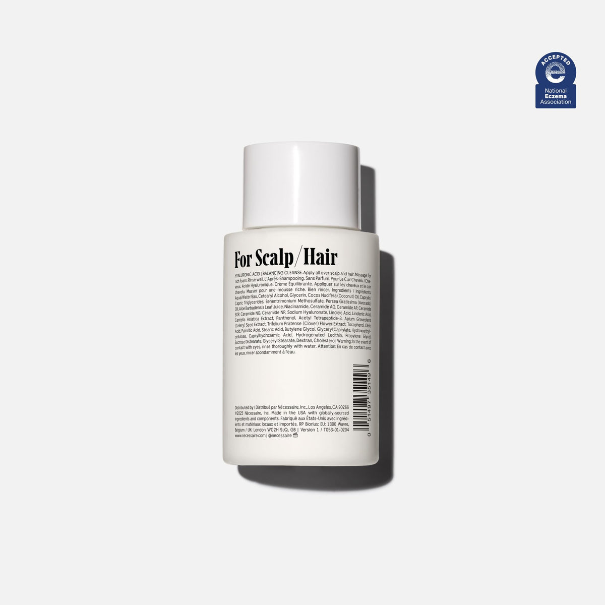 Nécessaire mini conditioner cap detail illustrating easy dispensing and leak prevention