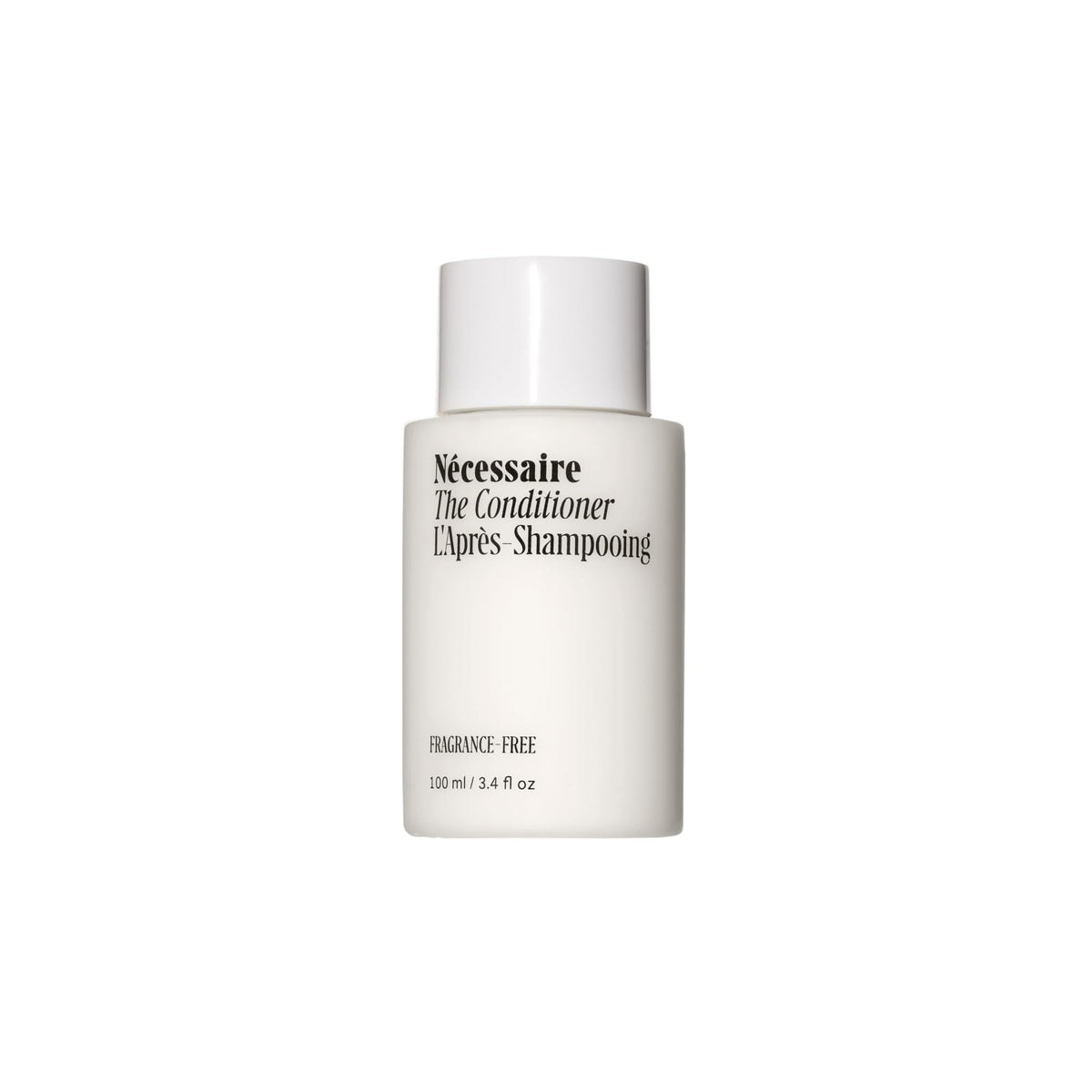 Nécessaire mini conditioner front bottle showing compact travel size and clarity