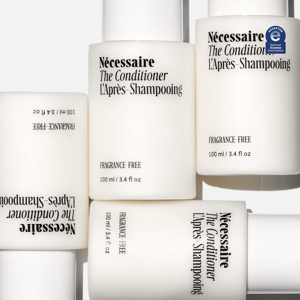 Nécessaire conditioner texture swatch showing creamy lightweight formula for soft hair