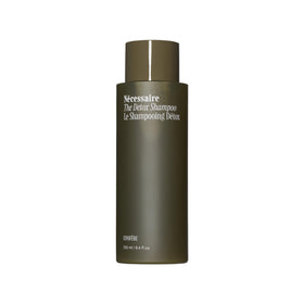 Nécessaire front bottle showing clean packaging and volume benefits
