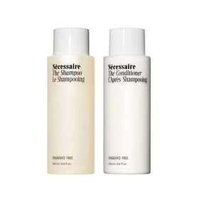 Nécessaire hair duo front packaging shows both bottles and benefits
