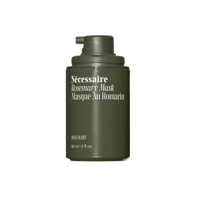 Nécessaire front bottle showing label and sleek packaging, conveys premium care