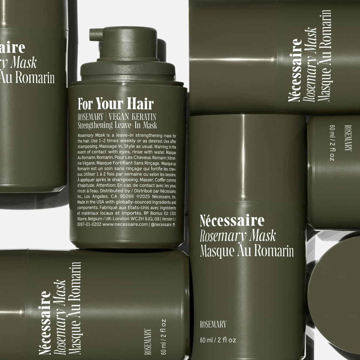 Nécessaire product in hand to show 60 ml scale and travel-friendly size