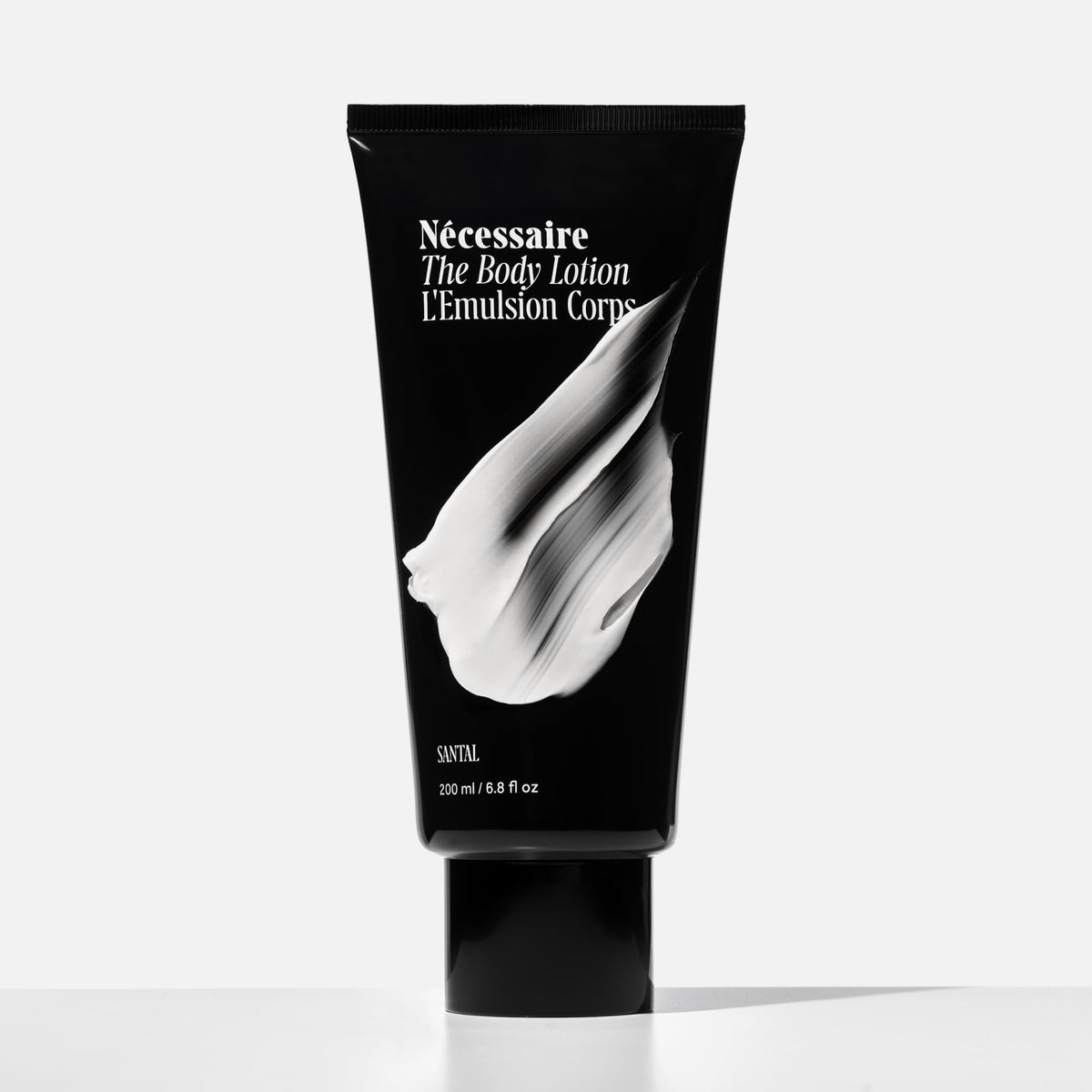 Nécessaire lotion texture close-up showing lightweight absorption benefit