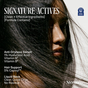 Nécessaire applying serum to scalp to show targeted fuller-hair benefit