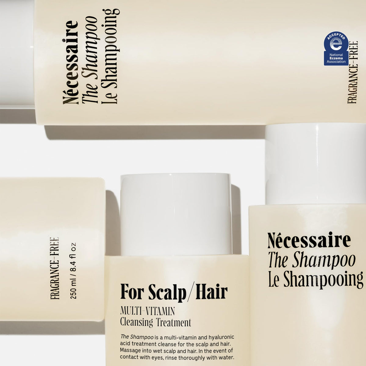 Nécessaire pump dispensing shampoo into hand for easy daily use benefit