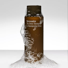Nécessaire shampoo foam texture demonstrating gentle, effective lather