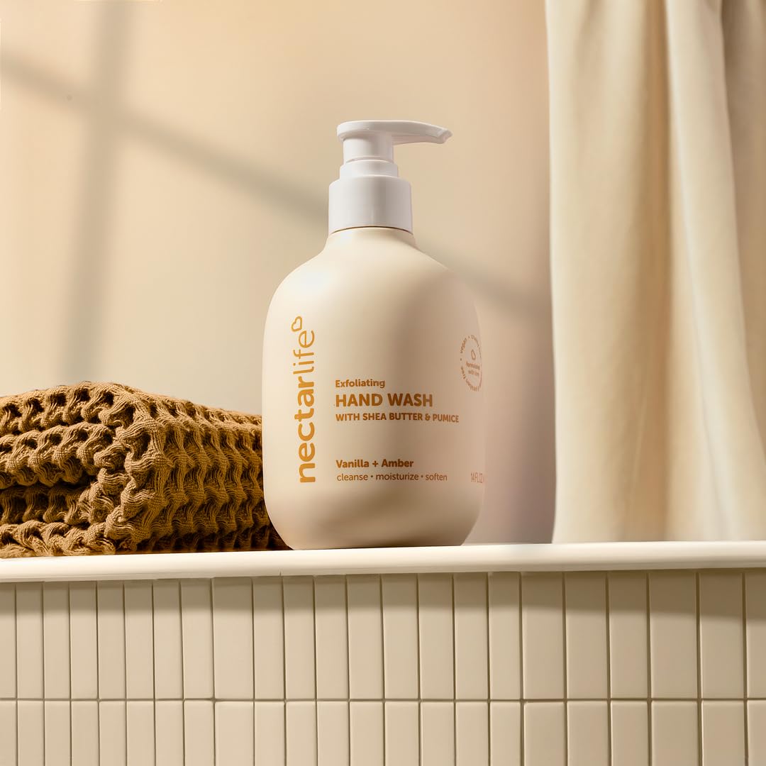 Nectar Life bottle on sink with vanilla props showing fragrant relaxing benefit