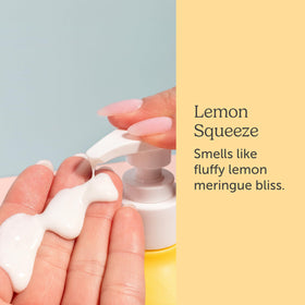 Nectar Bath Treats bottle next to hand for size and scale clarity