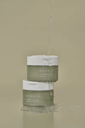 NEEDLY pad applied to cheek illustrating cooling and soothing effect
