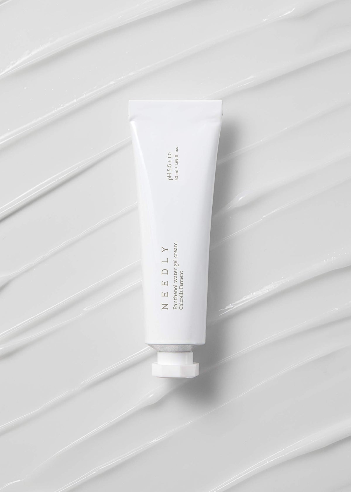 NEEDLY being applied to face for barrier support and smooth finish