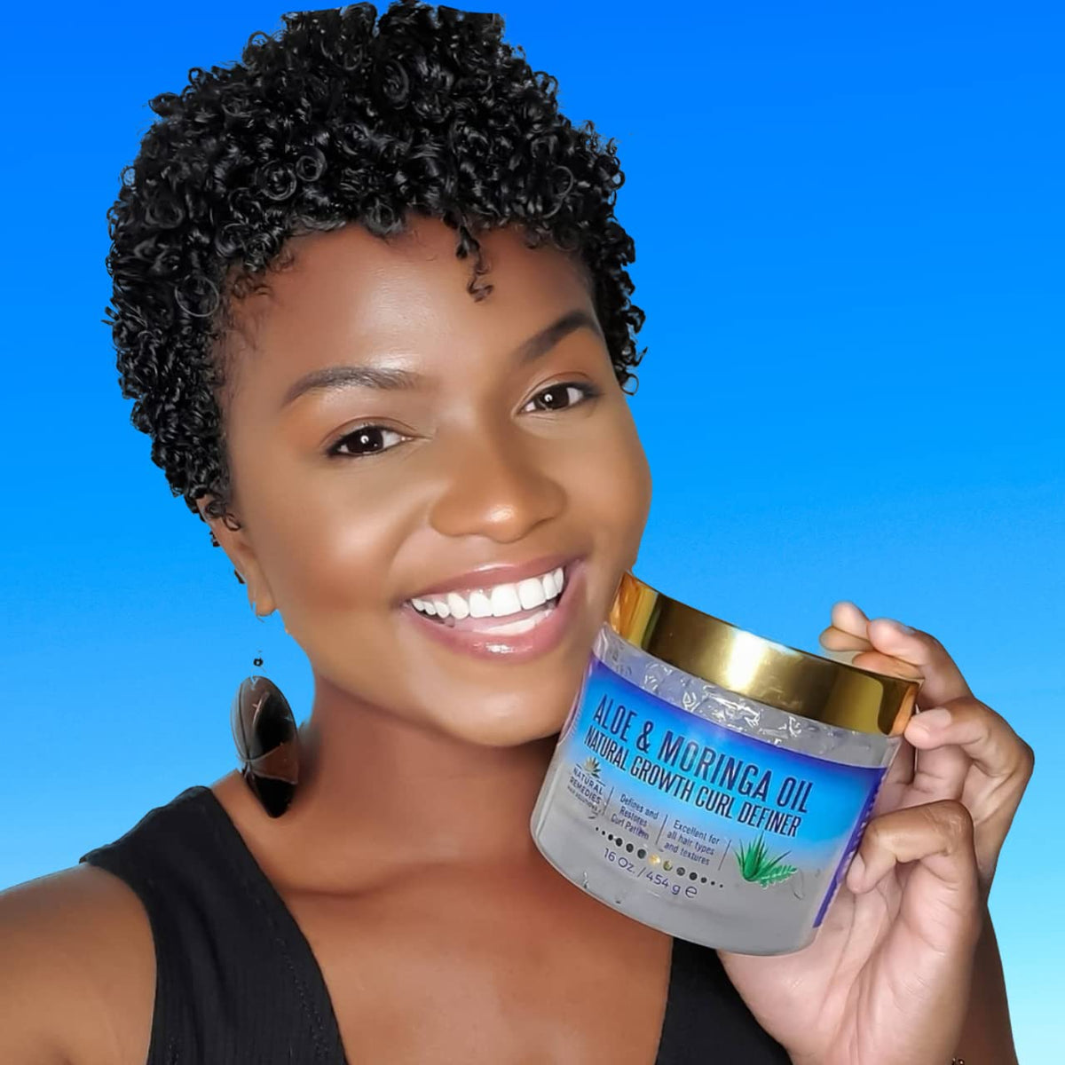 Nefertiti's Secrets hand applying gel for defined frizz-free curls
