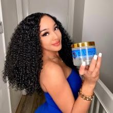 Nefertiti's Secrets 16 oz jar next to common object for scale