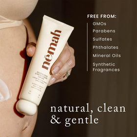 Nemah being applied to a pregnant belly illustrating gentle massage and even coverage benefit