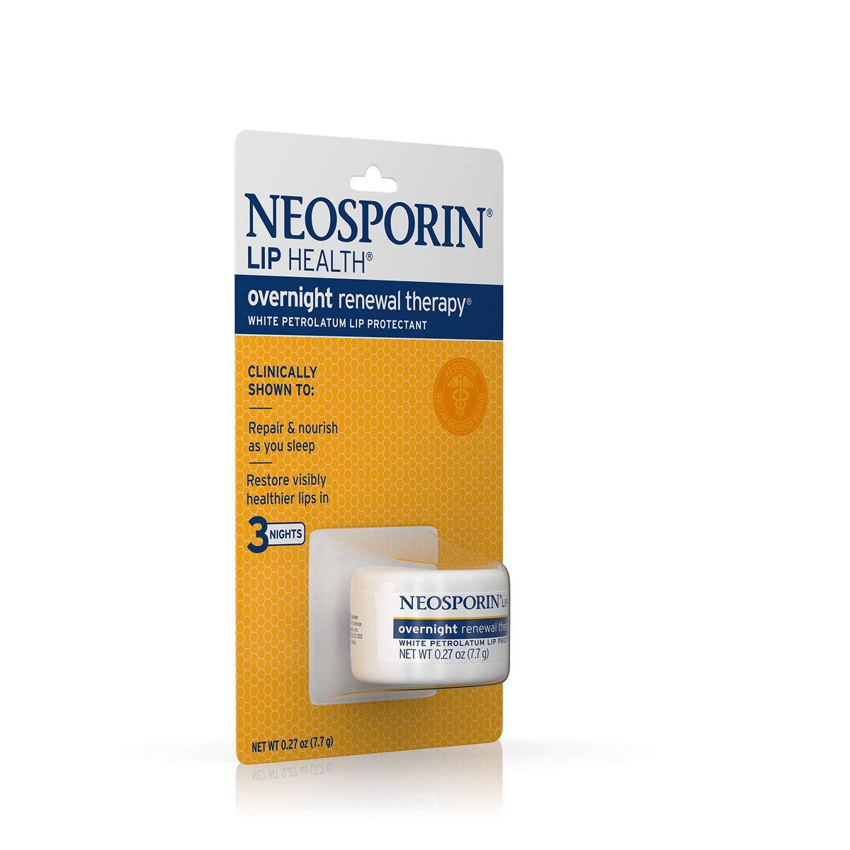 Neosporin tube next to coin showing compact travel-friendly size