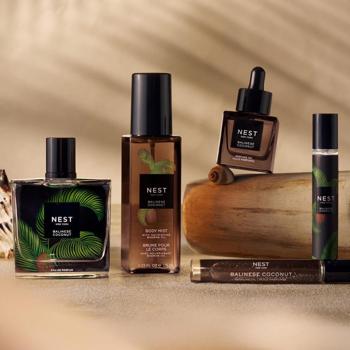 NEST New York dropper close-up dispensing oil, highlighting nourishing texture and easy application