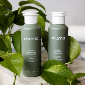 NEUMA recyclable bottle badge emphasizing sustainable packaging benefit