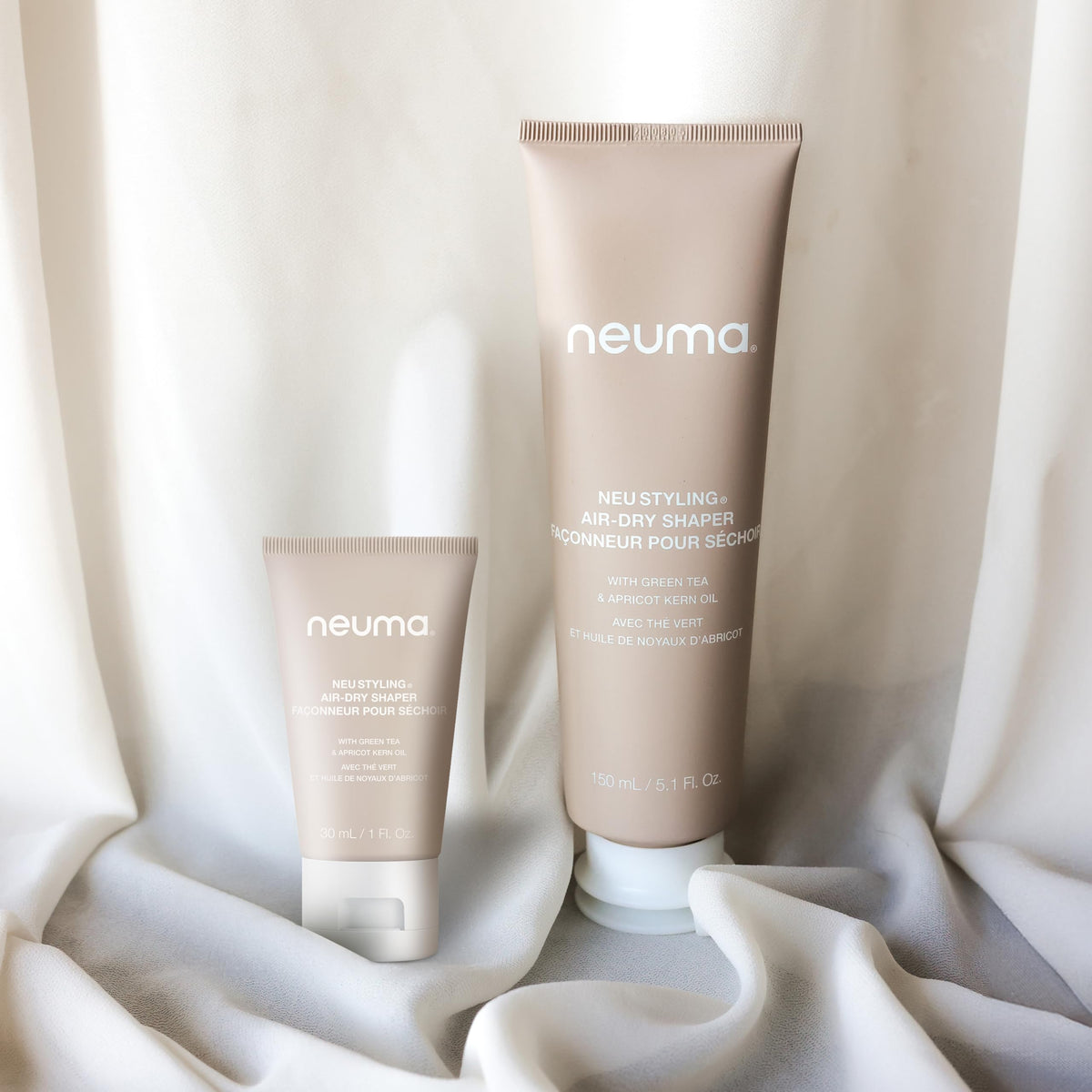 NEUMA recyclable bottle with windpower badge highlighting eco-friendly production