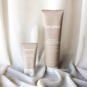 NEUMA recyclable bottle with windpower badge highlighting eco-friendly production