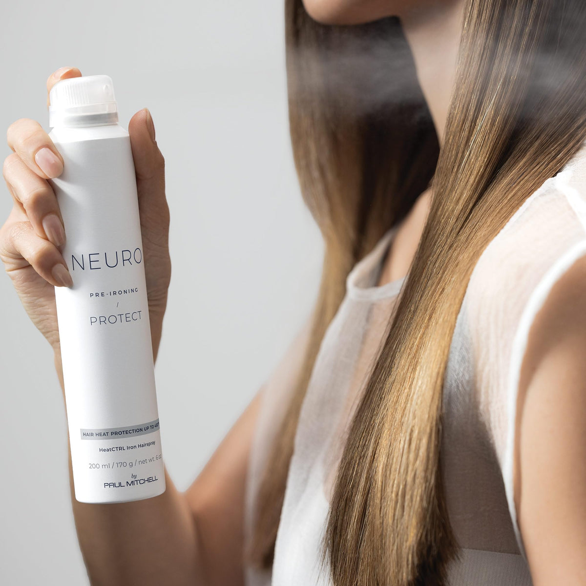 Neuro used by stylist during blowout to show professional prep and finish benefits